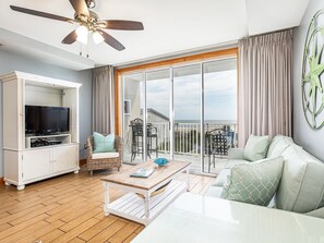 Living area with sleeper sofa and flat-screen TV