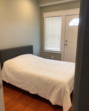 Bedroom 1 level 1 with balcony