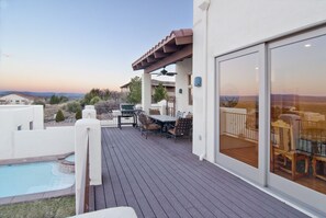 The view from our 60 foot deck. Below, the pool; ahead, the Red Rocks.