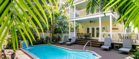 Relax in our private backyard with your own pool!