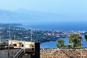 View from terrace of nearby seaside towns of Stazzo, Pozzillo and Taormina 