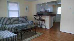 Living room with open floor plan into kitchen