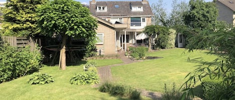 De tuin en het huis