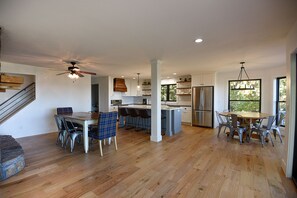 Great room opens to large dining areas and open-concept kitchen