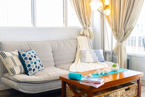 Studio comes with a reclining futon sofa that can be made into a comfortable bed.