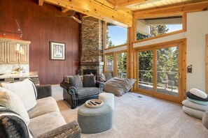 Great room with lots of seating and high ceilings