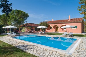 Impressive view of property and pool