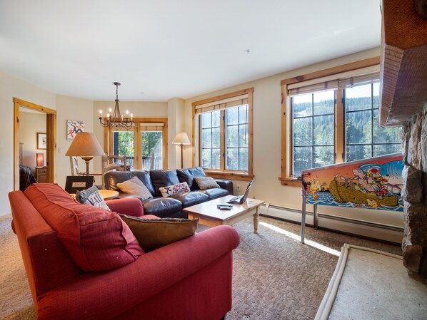 Living room with great views & pinball machine