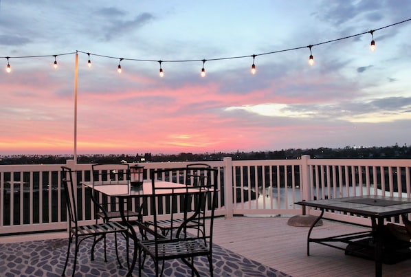 Enjoy the stunning views of the Pacific Ocean from the back deck and fire pit.