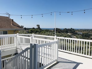 Outdoor deck with views of the ocean, lagoon, and connecting freeways