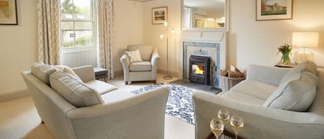 Ground floor: Sitting room with wood burning stove