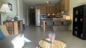 Large and modern, warm and cozy living room - open kitchen space view 