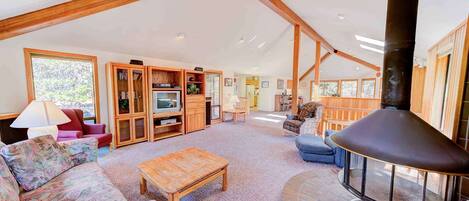 Upstairs living room with unique wood burning fireplace