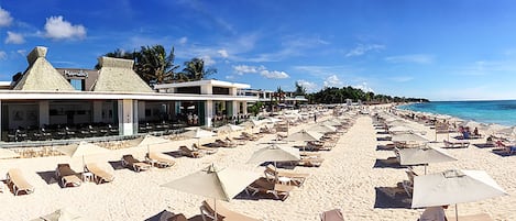 Mamitas a short walk - rent umbrella/chair or just lay a towel on beach!