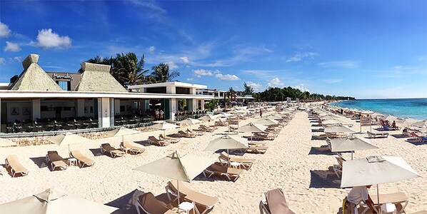 Mamitas a short walk - rent umbrella/chair or just lay a towel on beach!