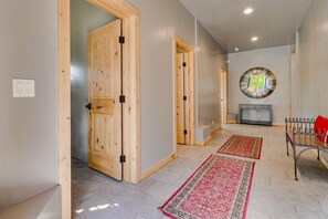 Entry Hall with Entry Closet and Full Bathroom.