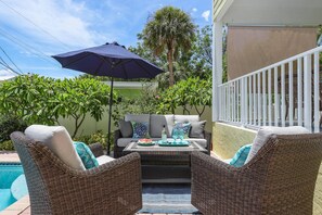 Relax next to the swimming pool in a comfortable chair and a yummy snack!