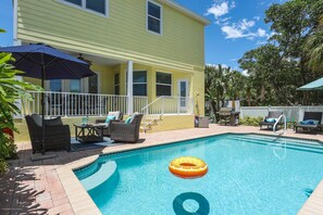 The Blue Mermaid is a spectacular custom home with a heated saltwater pool (heat extra)
