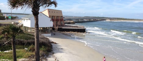 High tide hits our new seawall. Relax on the deck & you're still 'on the beach'