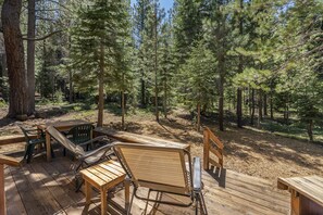 Back deck with dining and lounging options