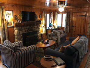 Living room with rock fireplace
