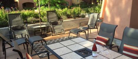 Sunny 400 sq.ft patio with patio furniture, umbrella, BBQ and firepit