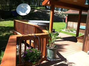 View of hot tub and back yard.