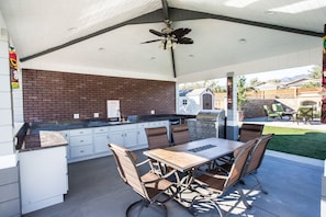 Outdoor Kitchen With Dining Area