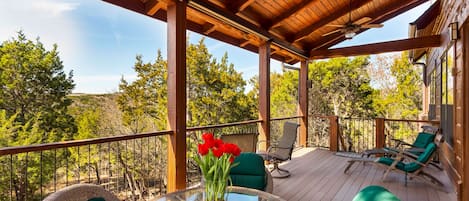 20' covered deck with views of the Texas Hill Country. Great place for dinner.