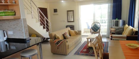 Open plan Kitchen salon with 2 balconies.