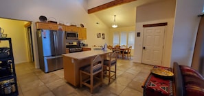 Full kitchen and dining area includes new appliances and plenty of seating.