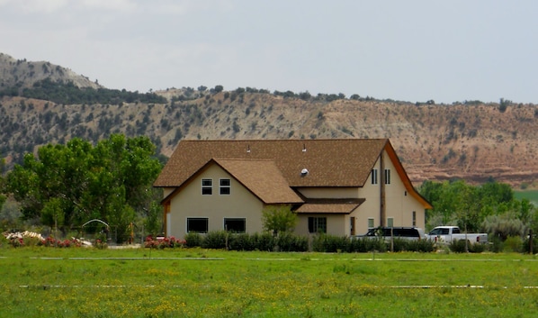 Our home at Sunrise Hollow in its pastoral setting