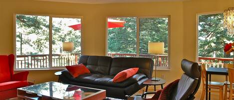Large, wrap-around windows give you a birds eye view of your vacation setting.