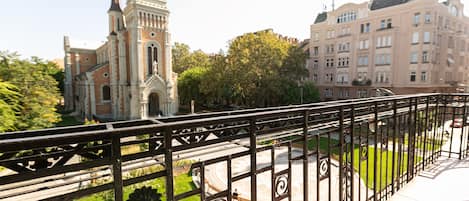 Huge balcony overlooking beautiful church square