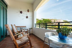 Enjoy the Balcony View while using the rocking chairs made by local artisans