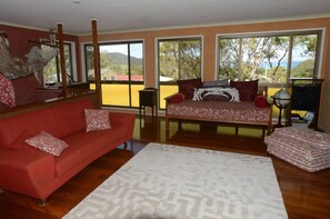 Large upstairs living area with bay views