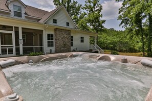 The sparkling hot tub invites you to unwind