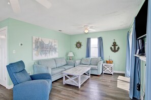 Open living area with a sofa sleeper