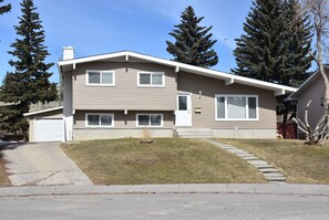 FRONT VIEW OF 4 LEVEL SPLIT HOME