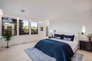 Upper level Master Bedroom, king bed, fireplace, flat screen tv.