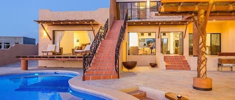 Balcony of master suite overlooking the pool and beach.