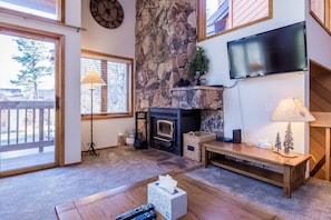Living Room / Wood Burning Fireplace / Flat Screen TV / Deck