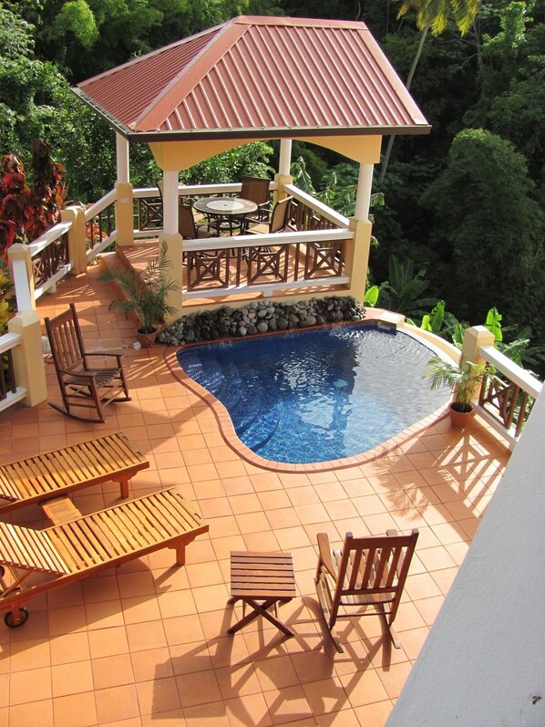 Shared pool overlooks tropical gardens with magnificent views!
