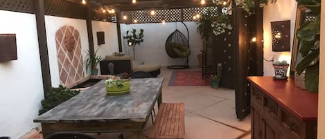 Private outdoor patio with space heater during cooler months
