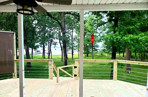 Very spacious partially covered deck with seating in or out of the sun.