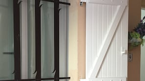 Window to the bedroom in the patio