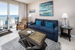 Living room and Dinning area - A comfortable sleeper sofa and leather chair are perfect for relaxing and enjoying the view. Check out all the modern touches in this gorgeous living room!