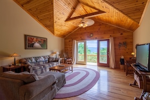 Main Level Living Room with Views, Stone Fireplace, Vaulted Ceilings, Flat Screen TV