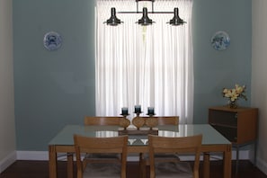 Dining Area- Seats 6 and room for additional seating outside at tables.