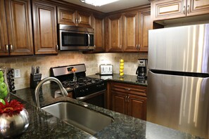 Custom Kitchen with granite countertops and Stainless Steel Appliances